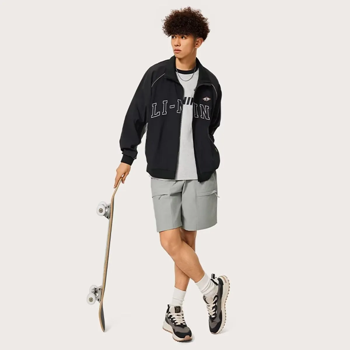 LI-NING Sports Trend Series Men's Anti Splash Loose Sports Windbreaker AFDU843